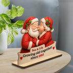 Growing Old Together With Santa Claus Figures