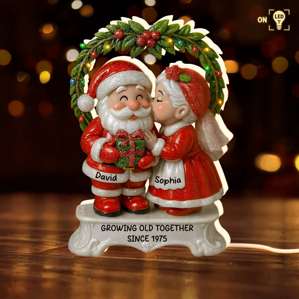 Growing Old Together Santa and Mrs. Claus Under Mistletoe