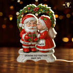 Growing Old Together Santa and Mrs. Claus Under Mistletoe
